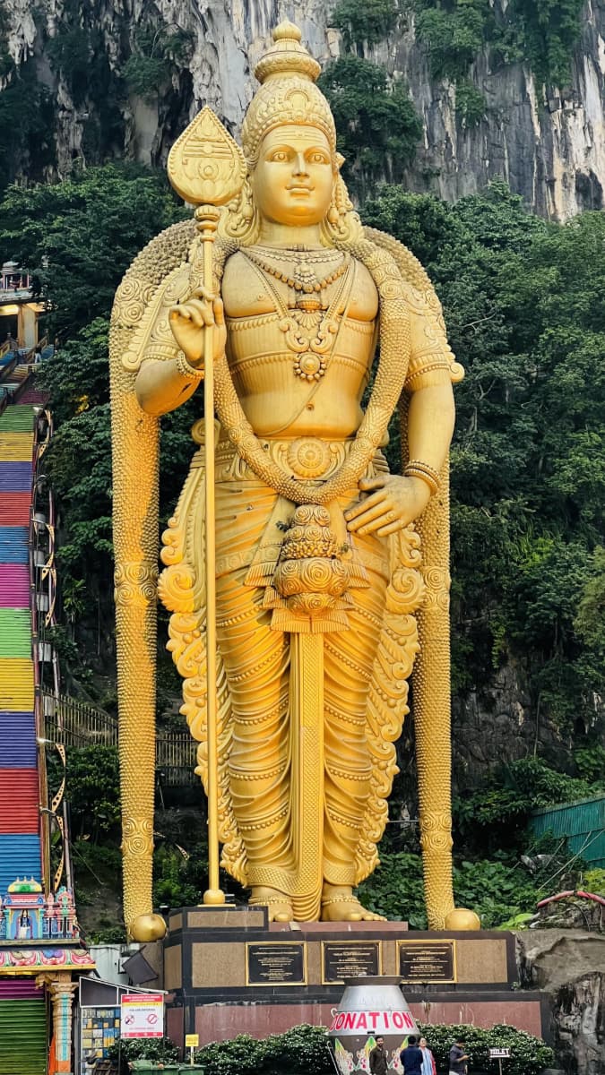 Batu Caves rainbow steps and statue