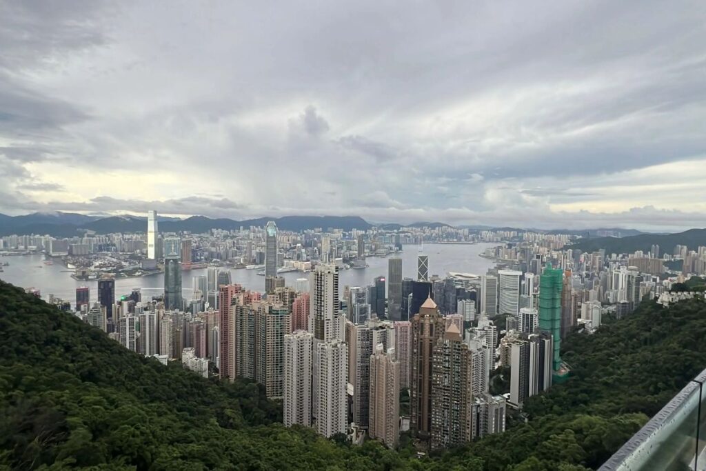 Hong Kong Macau itinerary Victoria Peak tram ascending Hong Kong Island with skyline views