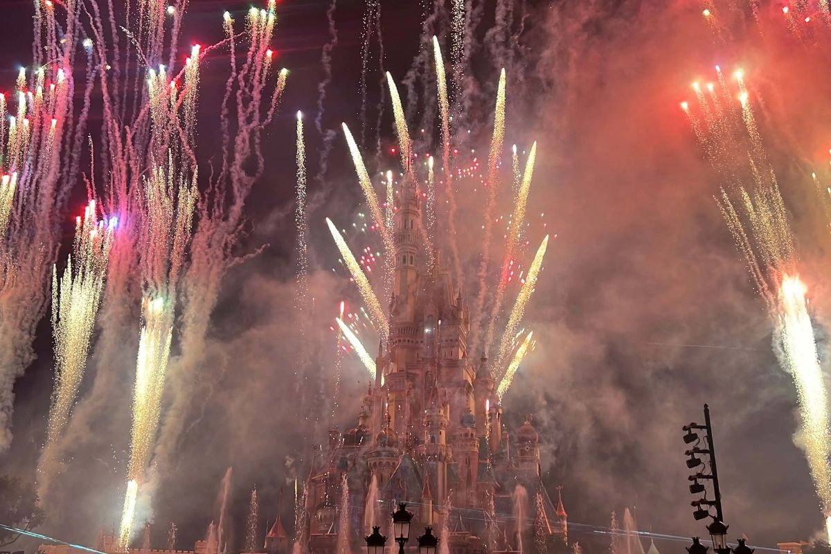 Hong Kong Macau itinerary Hong Kong Disneyland castle with fireworks and themed attractions